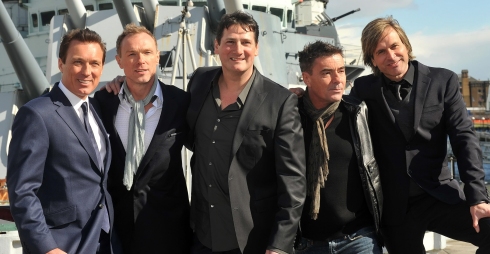Martin Kemp (L), Gary Kemp (2ndL), Tony Hadley (C), John Keeble (2ndR) and Steve Norman, (R) of 1980's pop group Spandau Ballet, gather to announce their reunion and tour on HMS Belfast in London, on March 25, 2009. British 1980's band Spandau Ballet are to become the latest ageing stars to hit the comeback circuit, two decades after their bitter split. AFP PHOTO/Leon Neal